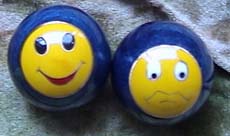 happy ball, and a sad ball set of balls