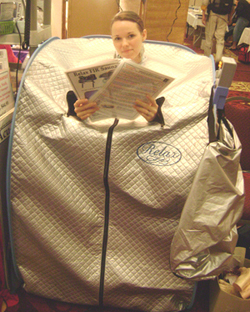 relax far infrared sauna using arm holes & reading