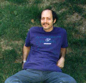 Phil resting on  grass lawn  in Pennsylvania