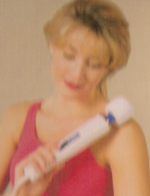 hitachi magic wand on shoulder